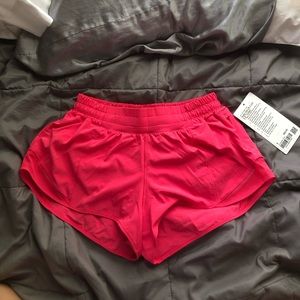 brand new lululemon hotty hot shorts in the shade “lipstick”
